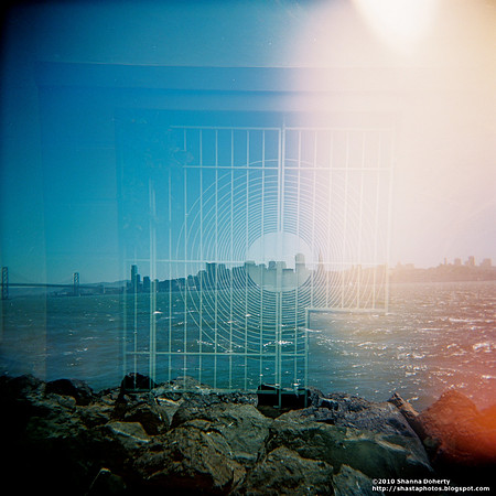 double-exposure-view-of-sf-from-treasure-island-and--a-sf-gate-in-castro_4754951791_o